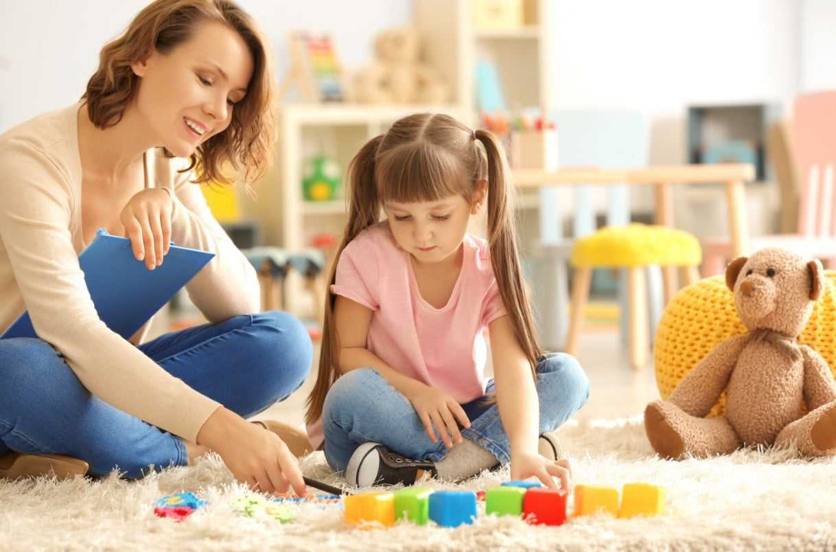 a child playing with blocks Christina Vaillancourt Registered Psychologist